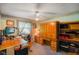 Cozy office featuring a large desk, ample storage, and a ceiling fan at 12142 N Paddock Rd, Camby, IN 46113