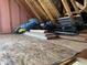 Unfinished attic storage area with exposed beams and plywood flooring at 13766 Heatherfield Dr, Fishers, IN 46038