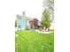 Expansive backyard with a pergola, patio area and fire pit, perfect for outdoor gatherings at 13766 Heatherfield Dr, Fishers, IN 46038