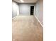 Large basement area features plush carpeting and a storage space at 13766 Heatherfield Dr, Fishers, IN 46038