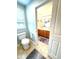 Bathroom featuring a toilet and open door to a double sink vanity at 13766 Heatherfield Dr, Fishers, IN 46038