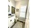 Half bathroom with stylish vanity and decorative artwork at 13766 Heatherfield Dr, Fishers, IN 46038