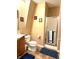 Cozy bathroom featuring a glass door shower and matching dark blue floor mats and towels at 13766 Heatherfield Dr, Fishers, IN 46038