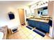 Spacious bathroom featuring double sinks with granite countertops and blue cabinetry at 13766 Heatherfield Dr, Fishers, IN 46038