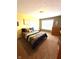 Bedroom with a queen bed, accent wall and natural light from the large window at 13766 Heatherfield Dr, Fishers, IN 46038