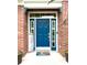 Welcoming blue front door with colorful mat and seasonal decorations at 13766 Heatherfield Dr, Fishers, IN 46038