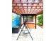 Backyard with an inviting hot tub under a pergola on a brick patio at 13766 Heatherfield Dr, Fishers, IN 46038