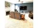 Comfortable living room features neutral walls, a fireplace, plush carpet and a large television at 13766 Heatherfield Dr, Fishers, IN 46038