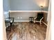 Functional office space with modern desk, chair, stylish flooring, and ambient lighting for work or study at 13766 Heatherfield Dr, Fishers, IN 46038