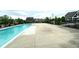 Community pool with a view of neighborhood homes under a cloudy sky at 13766 Heatherfield Dr, Fishers, IN 46038