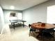 Recreation room with table tennis and game table, ideal for entertaining and leisure activities at 13766 Heatherfield Dr, Fishers, IN 46038
