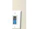 Close up of light switch with illuminated icons of light, sound, and fan settings at 13766 Heatherfield Dr, Fishers, IN 46038