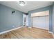 Well-lit bedroom features hardwood floors and a spacious closet, offering ample storage and natural light at 1416 Wellington Ave, Indianapolis, IN 46219