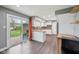 Updated kitchen with stainless appliances and sliding doors to the backyard at 1416 Wellington Ave, Indianapolis, IN 46219