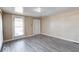 Inviting living room with a large window, fresh paint, and ample natural light at 1425 S Belmont Ave, Indianapolis, IN 46221
