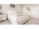 Comfortable bedroom with a floral bedspread, soft carpet, and a bright, airy atmosphere at 14878 Anees Ln, Fishers, IN 46040