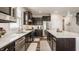 Well-appointed kitchen with stainless steel appliances, a central island, and plenty of storage at 14878 Anees Ln, Fishers, IN 46040