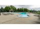 Community pool with lounge chairs and a splash pool for ultimate relaxation and enjoyment at 14878 Anees Ln, Fishers, IN 46040