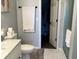 Bathroom showcases shower, toilet, marbled countertop vanity, and opens to a closet with plenty of storage space at 1502 Austin Dr, Lebanon, IN 46052