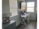 Bedroom area with a desk setup, two windows letting in light, and an organized space with good natural light at 1502 Austin Dr, Lebanon, IN 46052
