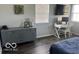 Cozy bedroom featuring a gray dresser, desk setup, and comfortable bed at 1502 Austin Dr, Lebanon, IN 46052