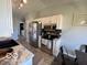 Spacious kitchen features stainless steel appliances, ample cabinet space, and modern countertops at 1502 Austin Dr, Lebanon, IN 46052