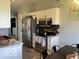 Kitchen featuring stainless steel appliances and white cabinets at 1502 Austin Dr, Lebanon, IN 46052