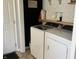Well-equipped laundry room featuring a modern washer and dryer at 1502 Austin Dr, Lebanon, IN 46052