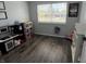 Bright playroom featuring luxury vinyl flooring, play kitchen, and a window for natural light at 1502 Austin Dr, Lebanon, IN 46052
