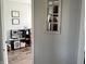 Bright playroom featuring luxury vinyl flooring, play kitchen, and a decorative mirror at 1502 Austin Dr, Lebanon, IN 46052