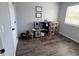 Light filled playroom offers plenty of space and features modern vinyl flooring at 1502 Austin Dr, Lebanon, IN 46052