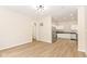 Spacious open-concept layout featuring modern stainless steel appliances and white cabinets at 1523 S K St, Elwood, IN 46036