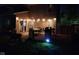 Inviting backyard patio with string lights, furniture, and a grill, perfect for outdoor entertaining at 15406 Destination Dr, Noblesville, IN 46060