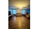 Spacious living room with wood floors, ceiling fans and lots of natural light at 15406 Destination Dr, Noblesville, IN 46060