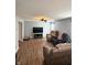 Living room showcases plank flooring and a ceiling fan at 15406 Destination Dr, Noblesville, IN 46060