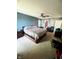 Spacious main bedroom featuring a large bed, ceiling fan, and walk-in closet at 15406 Destination Dr, Noblesville, IN 46060