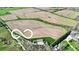 Expansive aerial view of the acreage of land with mature trees surrounding it at 1630 N 400 W, Bargersville, IN 46106