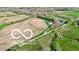 Aerial view of rural property with a house surrounded by farmland and trees at 1630 N 400 W, Bargersville, IN 46106