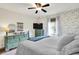 A cozy bedroom with floral wallpaper, bright window and mint green dressers at 1630 N 400 W, Bargersville, IN 46106