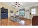 Cozy dining room with wood floors, table and chairs, and abundant natural light at 1630 N 400 W, Bargersville, IN 46106