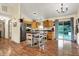 Bright kitchen featuring wood cabinets, an island with seating, and stainless steel appliances at 1630 N 400 W, Bargersville, IN 46106