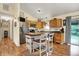Modern kitchen with wood cabinets, stainless steel appliances, and a functional center island at 1630 N 400 W, Bargersville, IN 46106