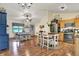 Open kitchen and dining room layout with updated appliances and ample counter space at 1630 N 400 W, Bargersville, IN 46106