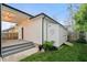 Charming backyard featuring a small patio area and storage shed for outdoor equipment at 2044 Alvord St, Indianapolis, IN 46202