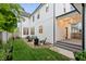 Spacious backyard with a well-manicured lawn and patio area, perfect for outdoor activities at 2044 Alvord St, Indianapolis, IN 46202