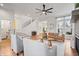 Spacious living room showcases a fireplace, hardwood floors, and staircase access at 2044 Alvord St, Indianapolis, IN 46202