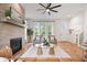 Cozy living room with fireplace, hardwood floors, and plenty of natural light at 2044 Alvord St, Indianapolis, IN 46202