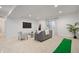 Inviting living room showcases neutral tones, plush seating, and a mini golf area at 2044 Alvord St, Indianapolis, IN 46202