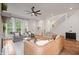 Bright and open living room featuring hardwood floors, fireplace, and staircase at 2044 Alvord St, Indianapolis, IN 46202