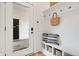 Convenient mudroom with built-in bench, storage, and coat hooks near the entrance at 2044 Alvord St, Indianapolis, IN 46202